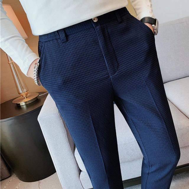 Slim-fit trousers with a subtle checked pattern