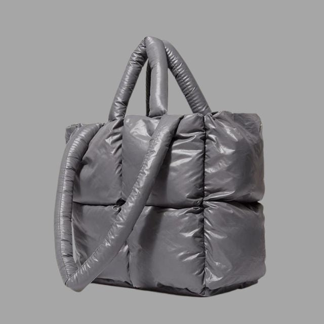 Metallic puffer carrier bag with ruffled design