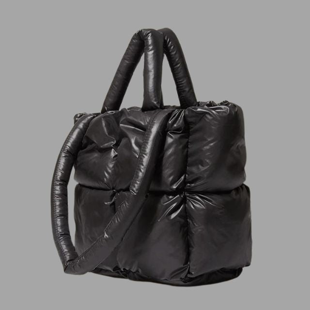 Metallic puffer carrier bag with ruffled design