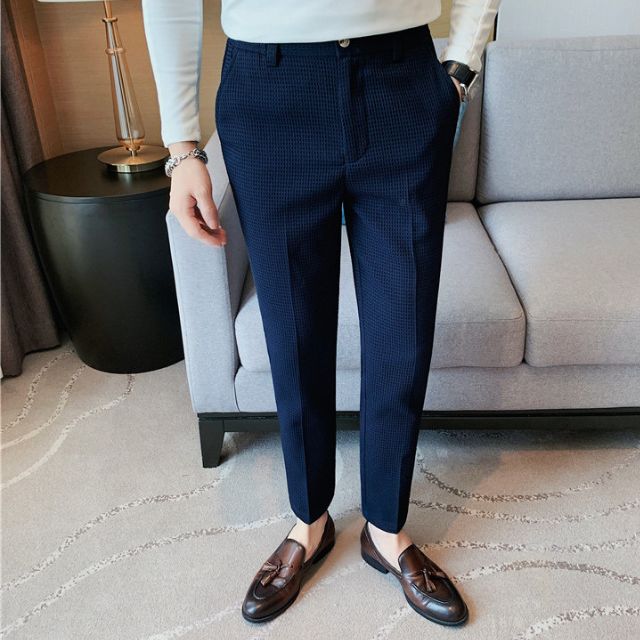 Slim-fit trousers with a subtle checked pattern