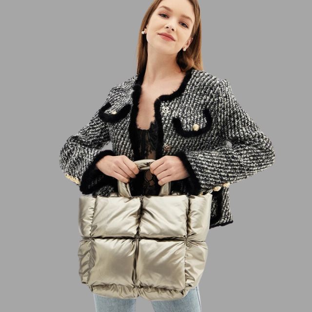 Metallic puffer carrier bag with ruffled design