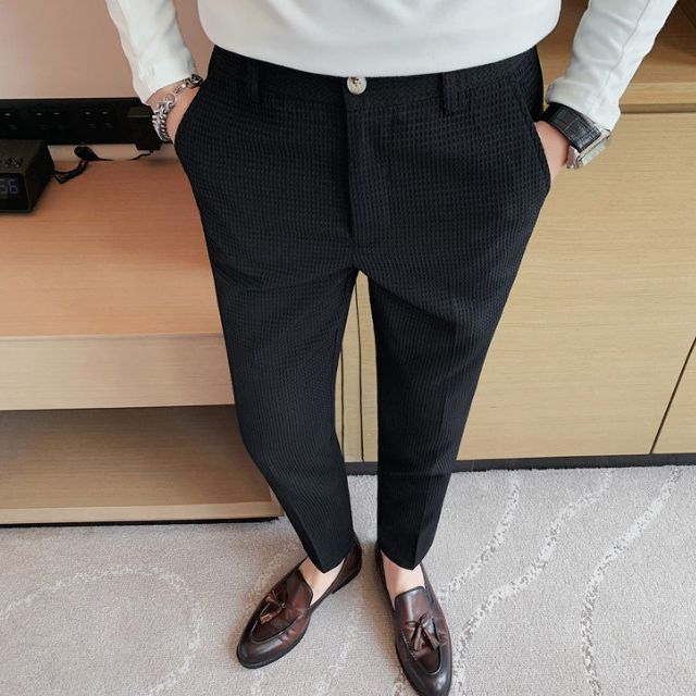 Slim-fit trousers with a subtle checked pattern