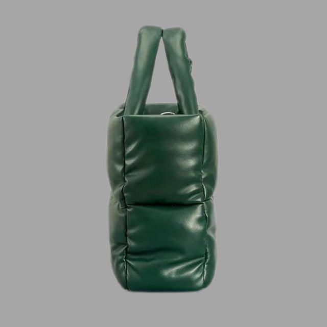 Metallic puffer carrier bag with ruffled design