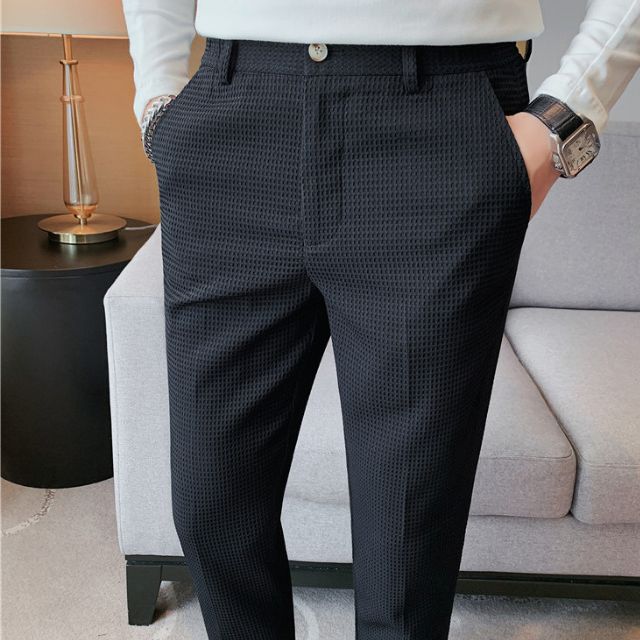 Slim-fit trousers with a subtle checked pattern