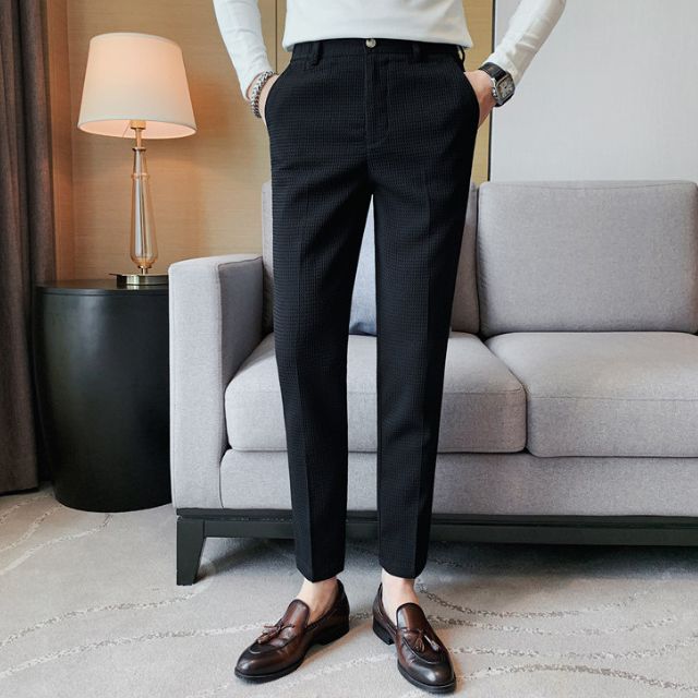 Slim-fit trousers with a subtle checked pattern