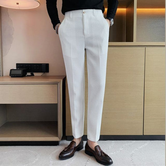 Slim-fit trousers with a subtle checked pattern