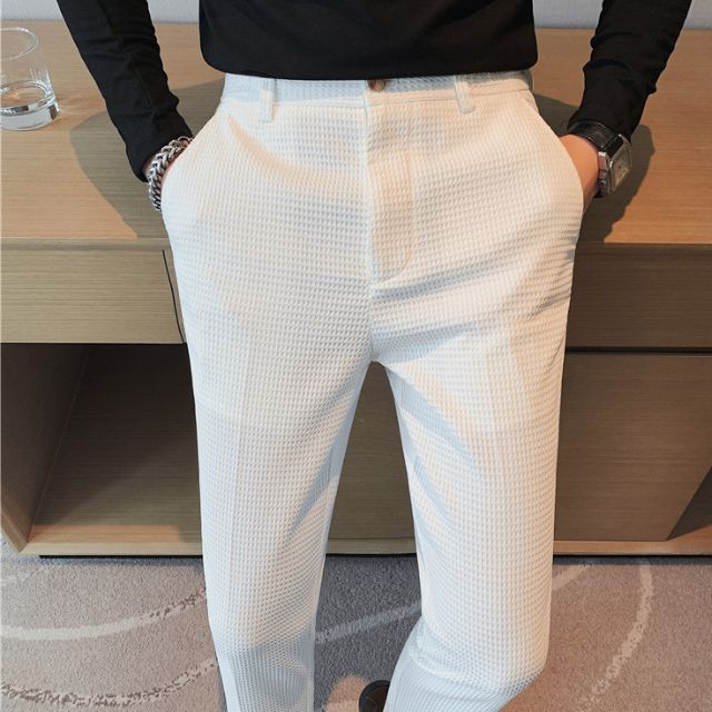 Slim-fit trousers with a subtle checked pattern