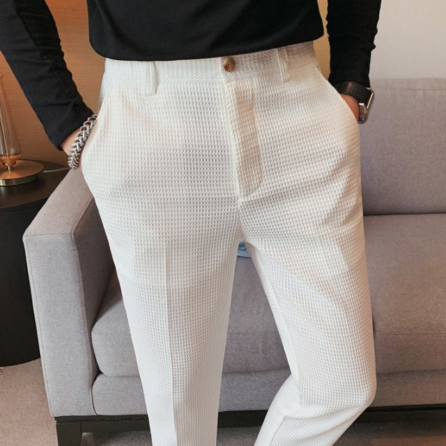 Slim-fit trousers with a subtle checked pattern