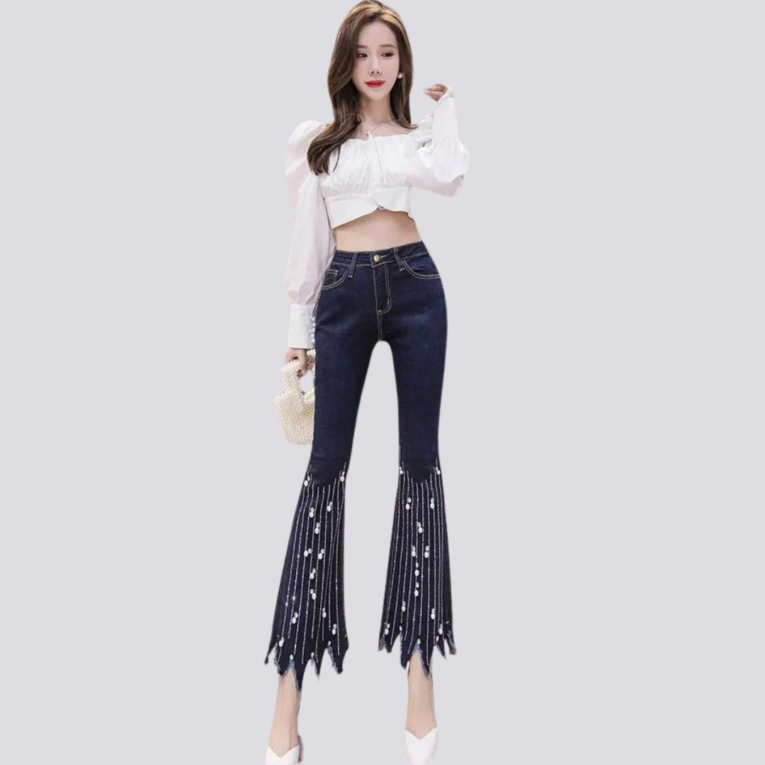 High-waist flare jeans with pearl tassel detail