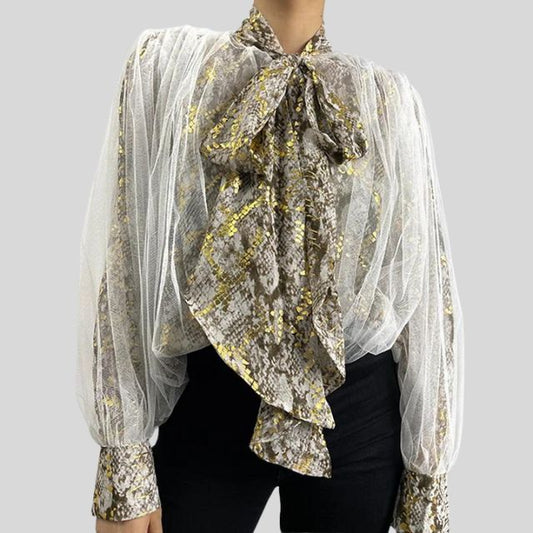 Snake-print mesh blouse with ruffles