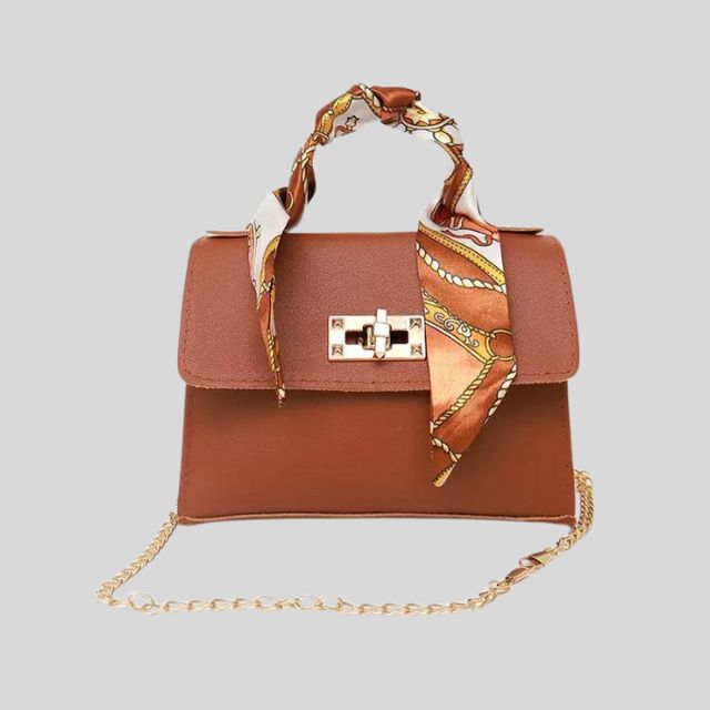 Classic handbag with silk scarf and chain detail