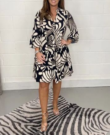 Printed mid-length dress with flared sleeves