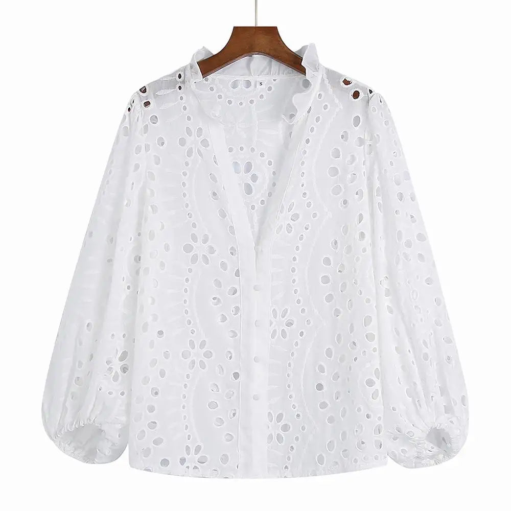 Lace blouse with embroidery