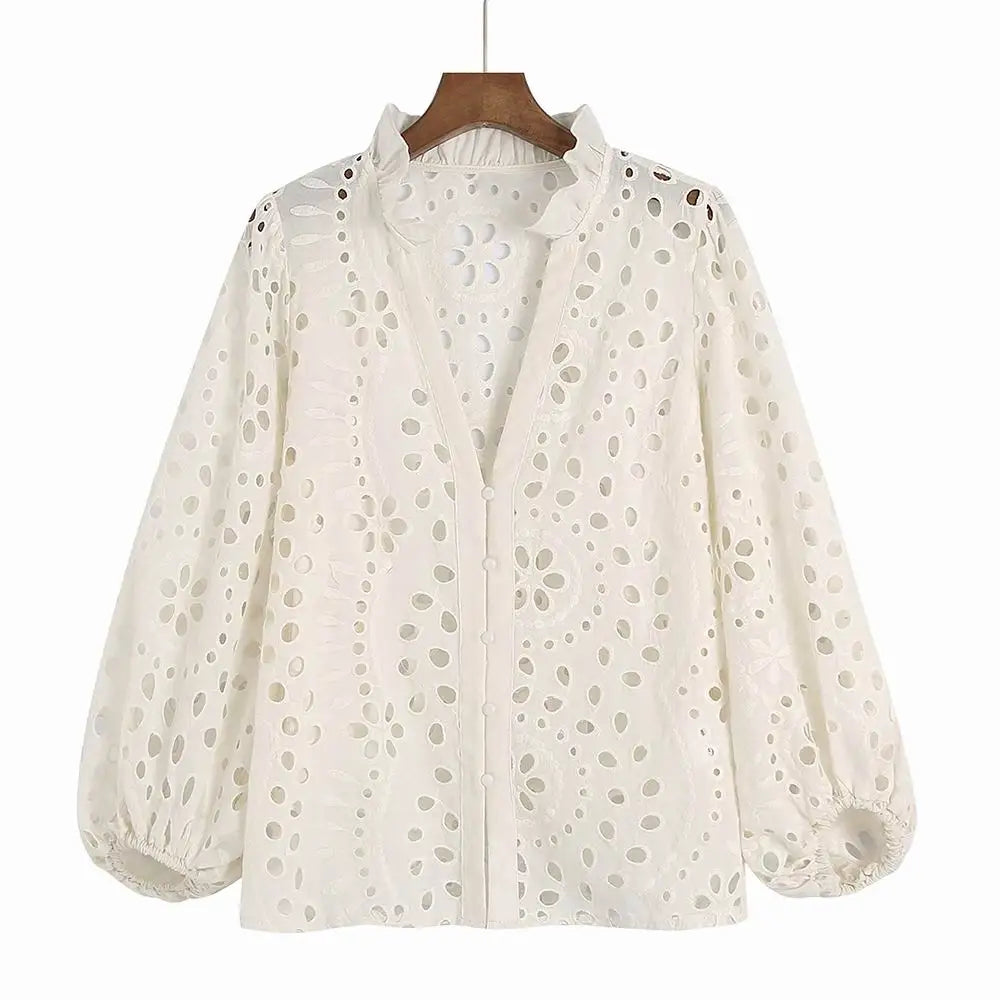 Lace blouse with embroidery