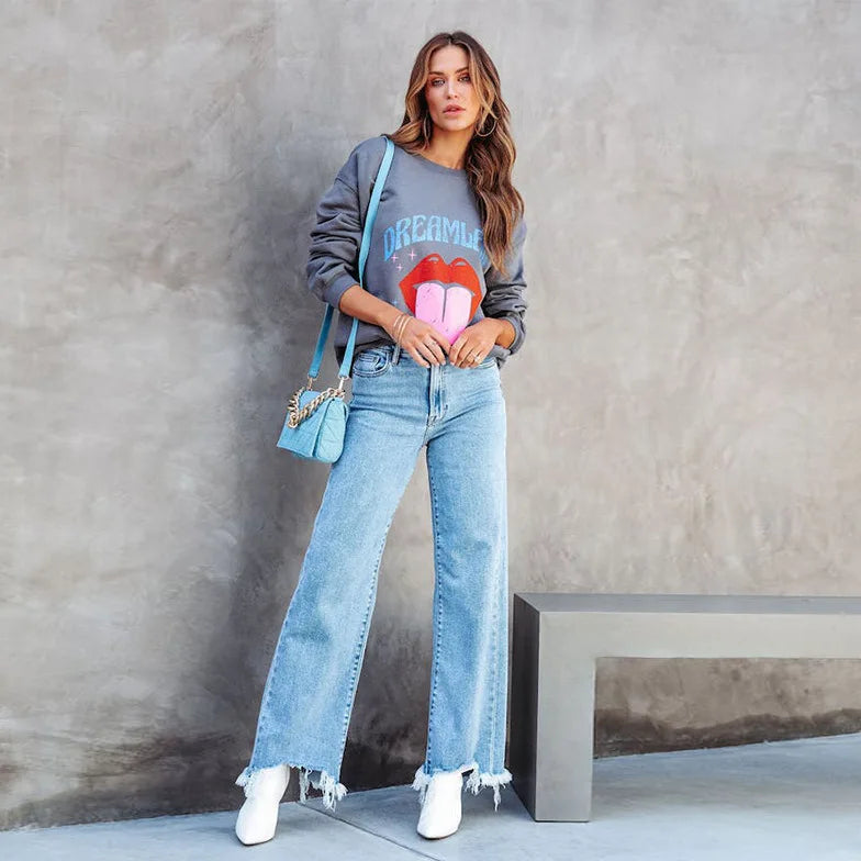 Straight jeans with fringed hem