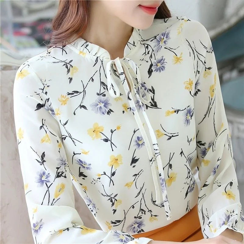 Chiffon blouse with floral pattern and bow collar