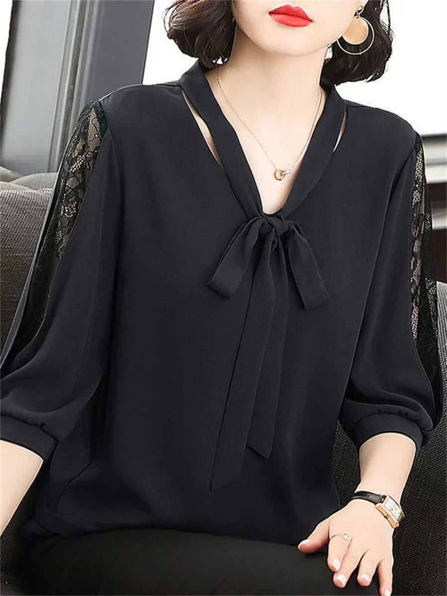 Blouse with bow collar and lace sleeves