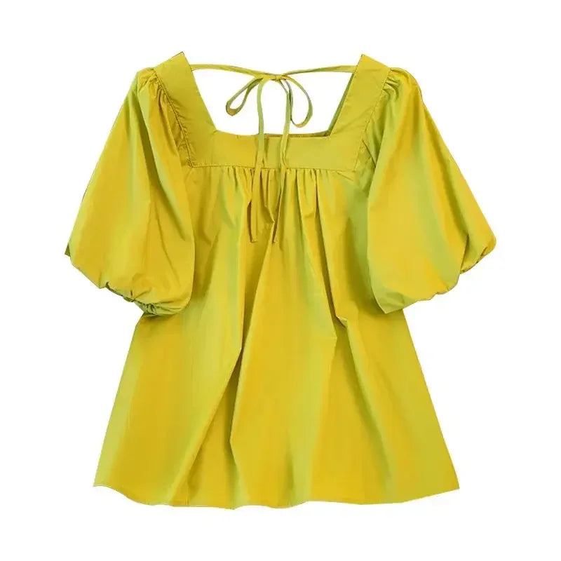 Trendy summer blouse with puff sleeves