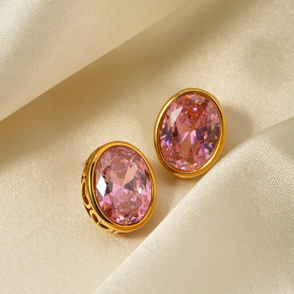 Zircon stud earrings in gold setting