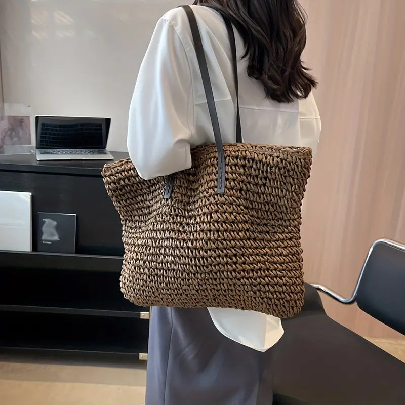 Woven carrier bag with leather straps