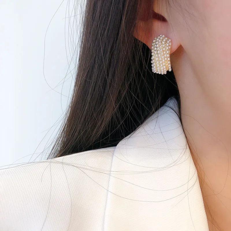 Chic earrings with pearl embellishment