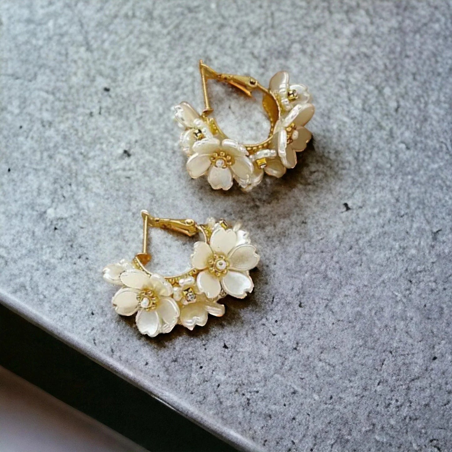 Flower hoop earrings with crystal centres