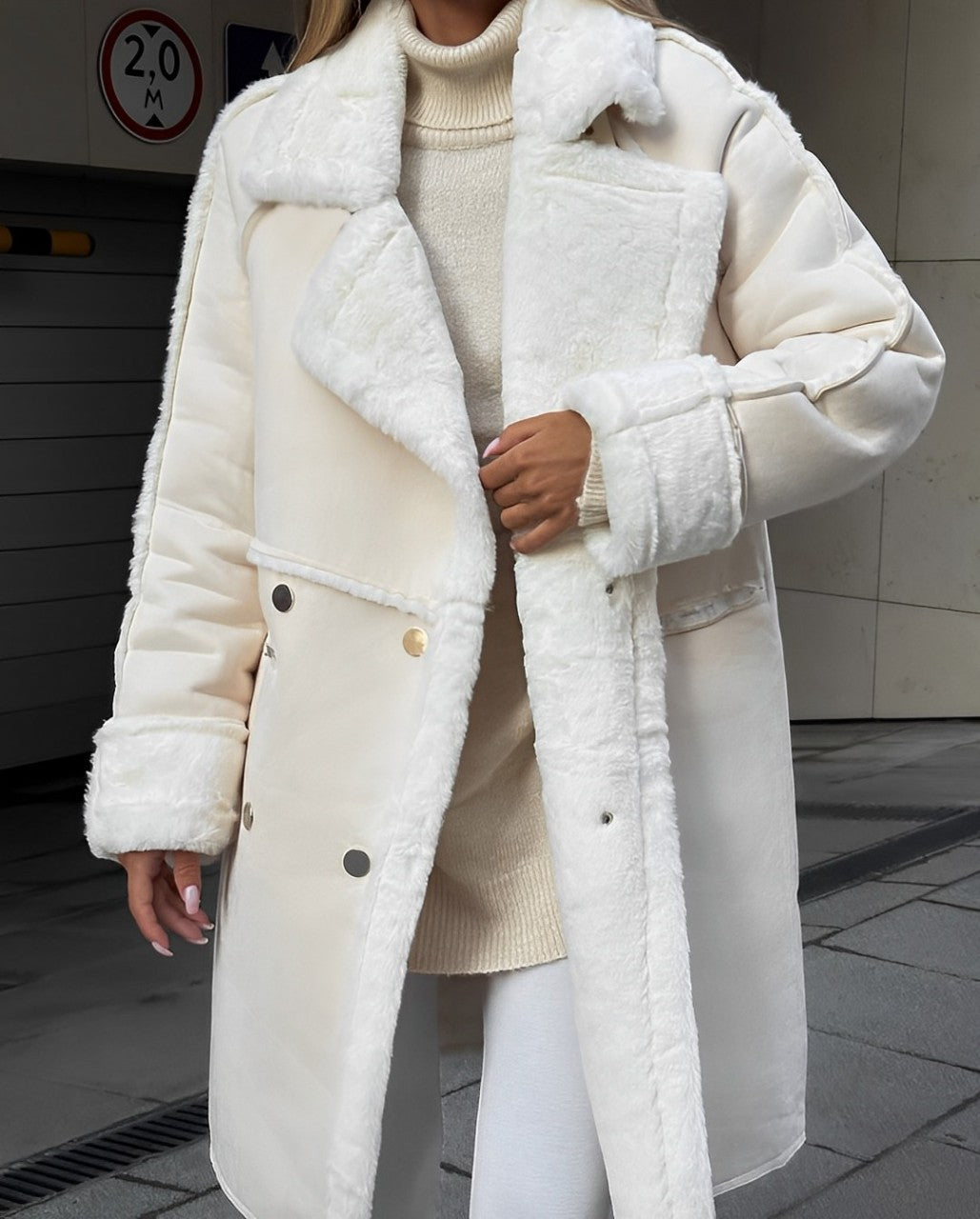 Long suede coat with fur trim