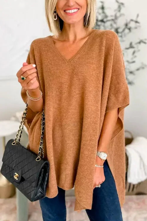 Sweater with irregular hem and V-neckline