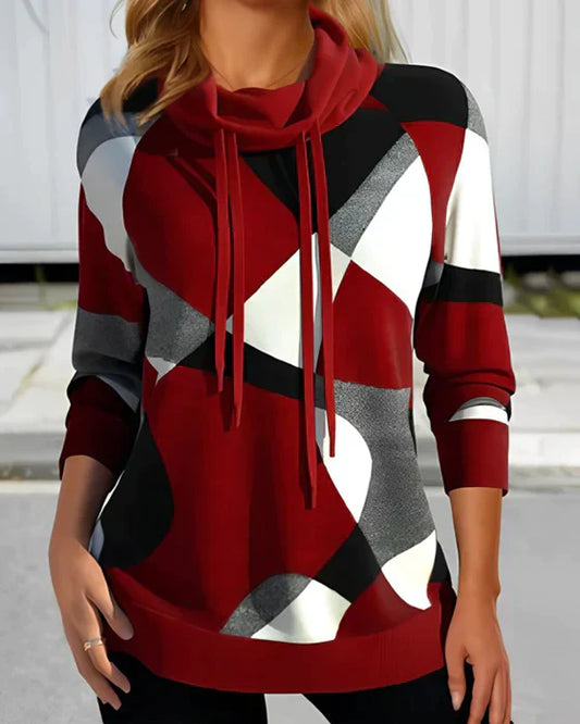 Hooded top with high collar and contrasting colour