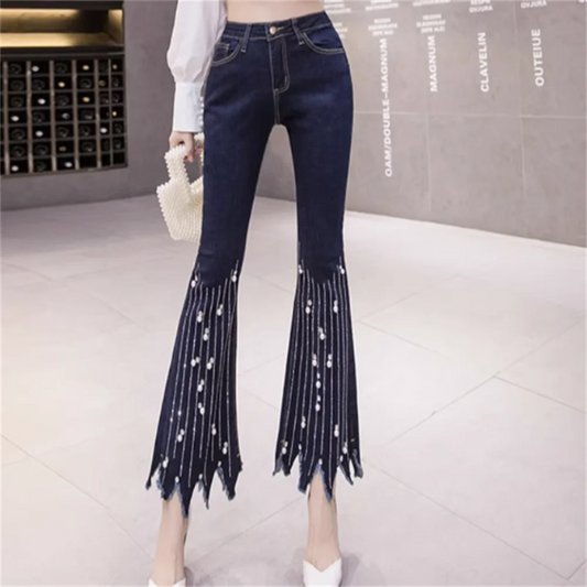 High-waist flare jeans with pearl tassel detail