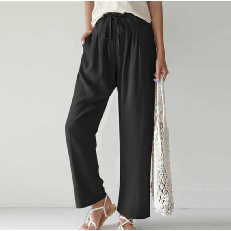 Elasticated waist Pleated front pocket Wide leg casual trousers