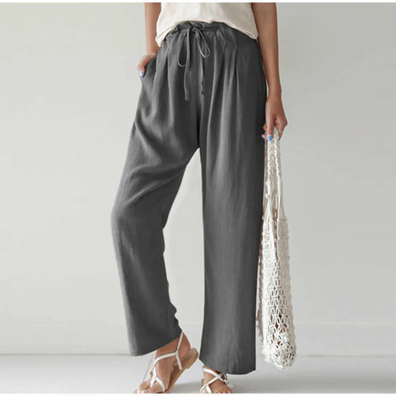 Elasticated waist Pleated front pocket Wide leg casual trousers