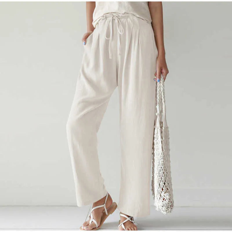 Elasticated waist Pleated front pocket Wide leg casual trousers